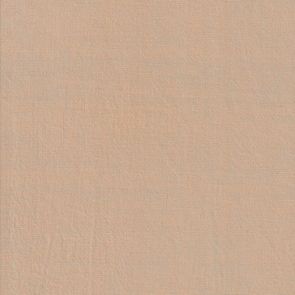 A close-up of Watercolor Wovens in Champagne for Fableism shows its plain, light beige, subtly textured 100% cotton surface—perfect for patchwork, with no patterns or distinct markings.