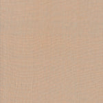 A close-up of Watercolor Wovens in Champagne for Fableism shows its plain, light beige, subtly textured 100% cotton surface—perfect for patchwork, with no patterns or distinct markings.